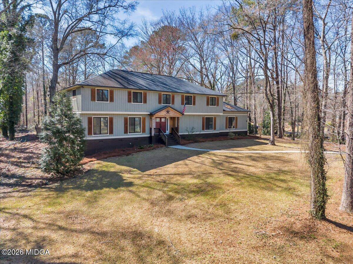 5256 Rivoli Drive Macon, GA 31210 - Photo 83 of 91 a front view of a house with a yard