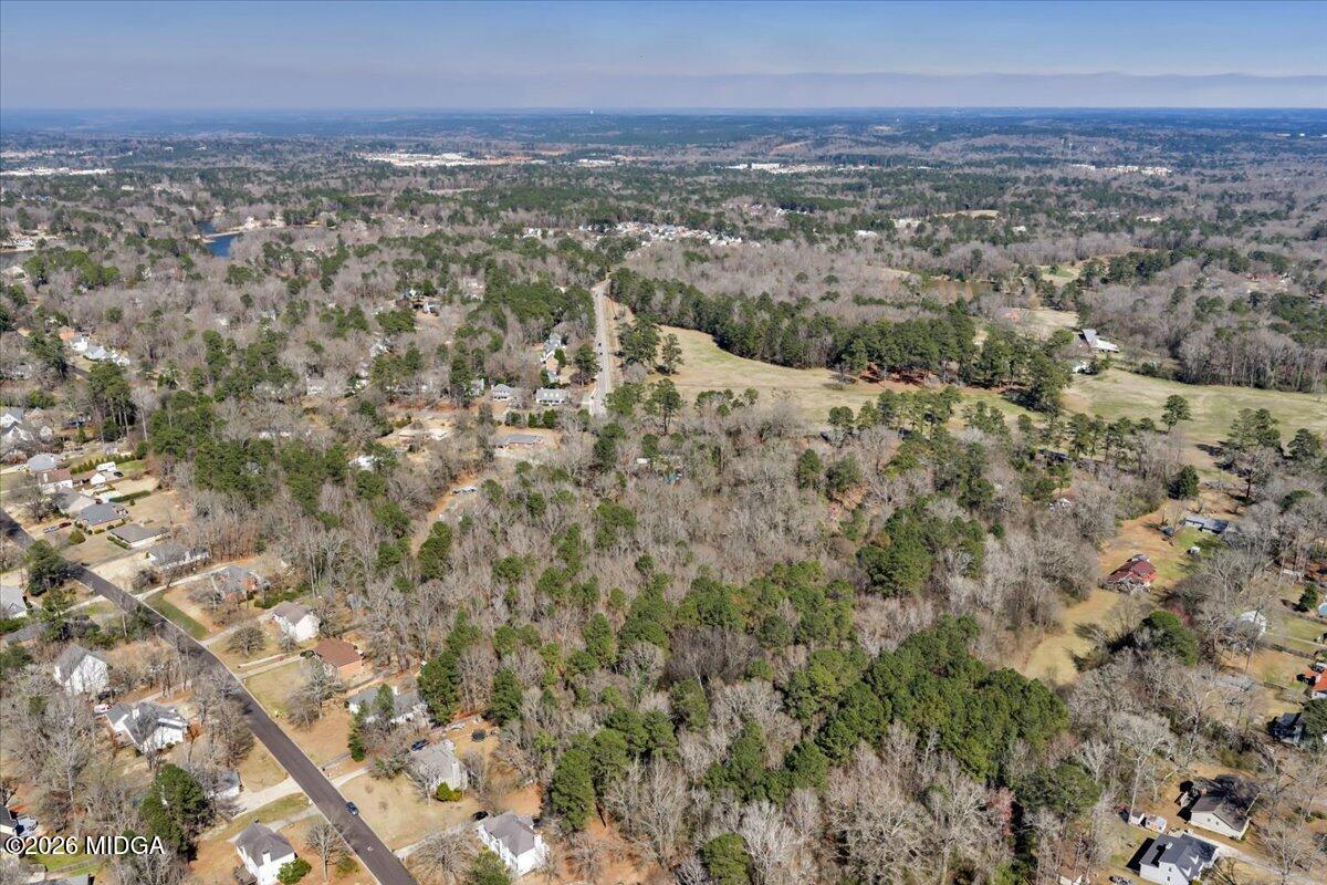 5256 Rivoli Drive Macon, GA 31210 - Photo 90 of 91 an aerial view of residential houses with outdoor space and trees