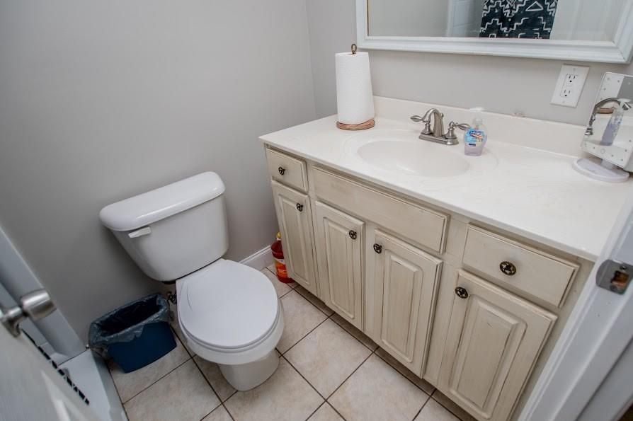 575 Liberty Church Road Carrollton, GA 30116 - Photo 58 of 95 a white toilet sitting next to a bathroom sink