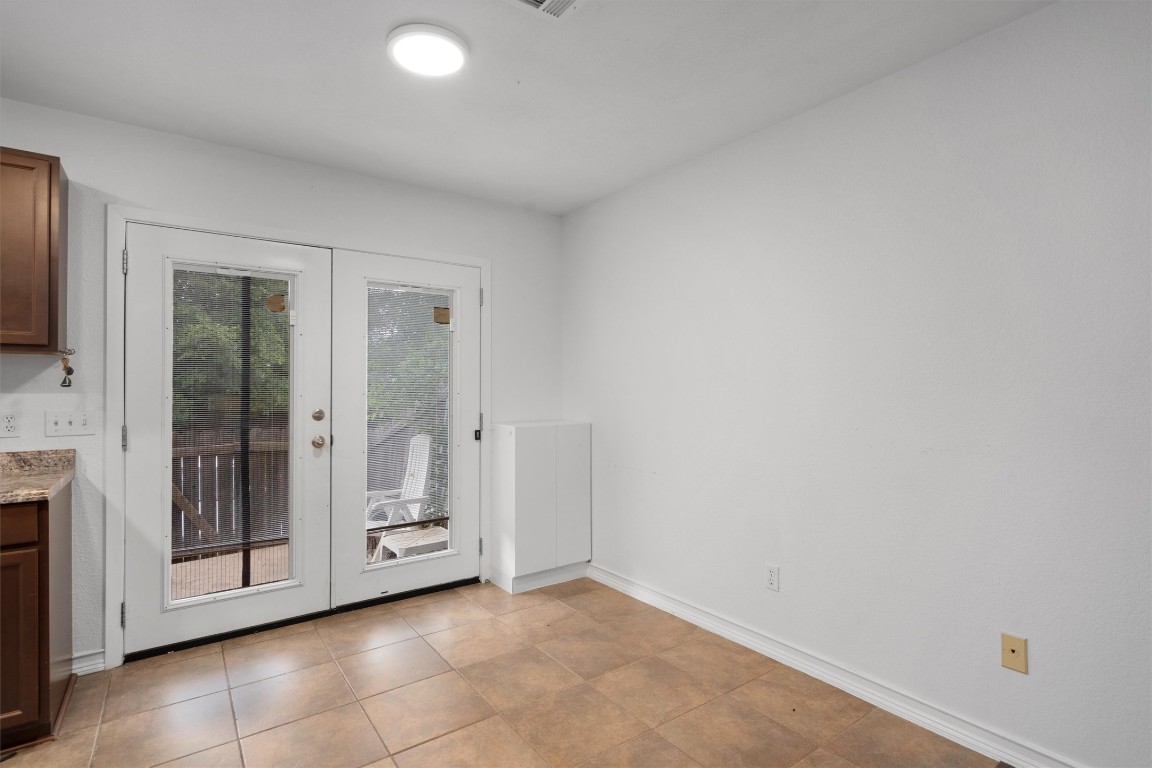1015 East Yager Lane, Unit 129 Austin, TX 78753 - Photo 12 of 39 a view of an empty room and window