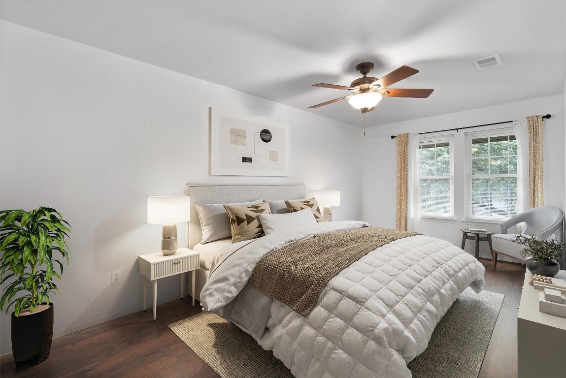 1015 East Yager Lane, Unit 129 Austin, TX 78753 - Photo 19 of 39 a bedroom with a bed and a window