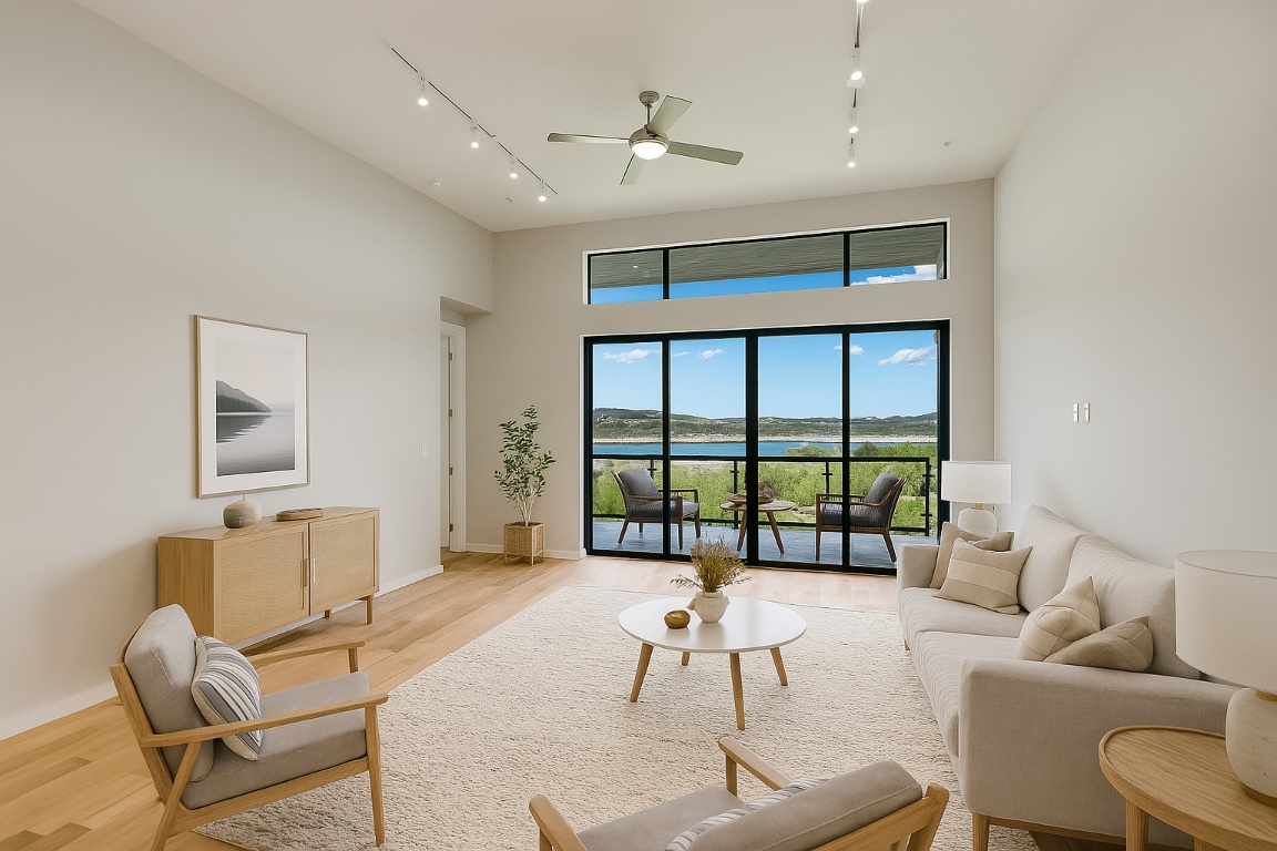 5921 Hiline Road, Unit 2403 Austin, TX 78734 - Photo 2 of 35 a living room with furniture and a large window