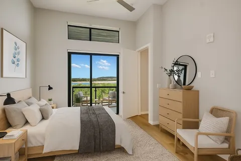 a bathroom with a double vanity sink a mirror and a shower