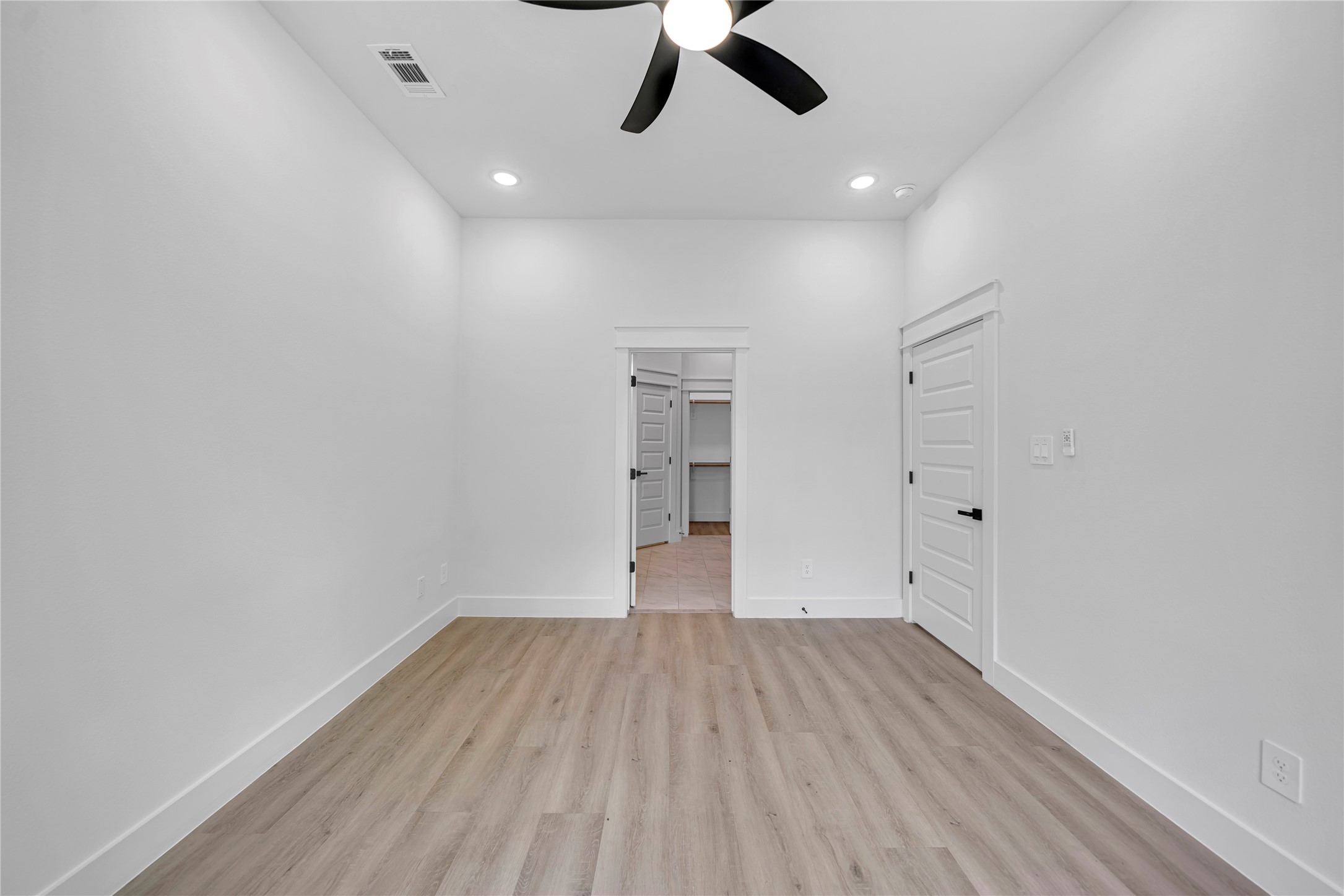 4834 Higgins Street, Unit B Houston, TX 77033 - Photo 12 of 34 a view of empty room with wooden floor