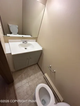 a bathroom with a sink and vanity