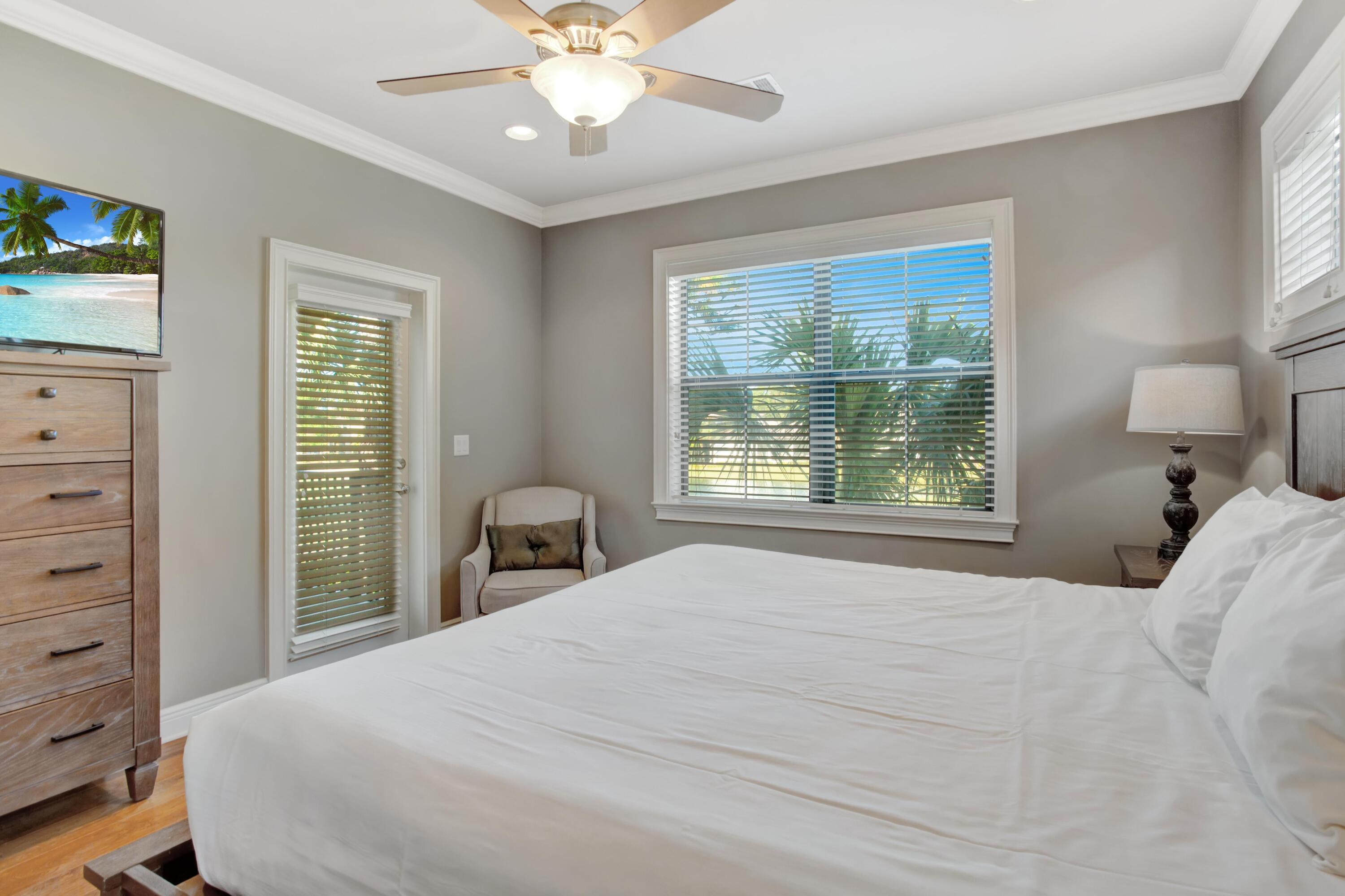 1917 Baytowne Loop Miramar Beach, FL 32550 - Photo 32 of 39 a bedroom with a large bed and a window