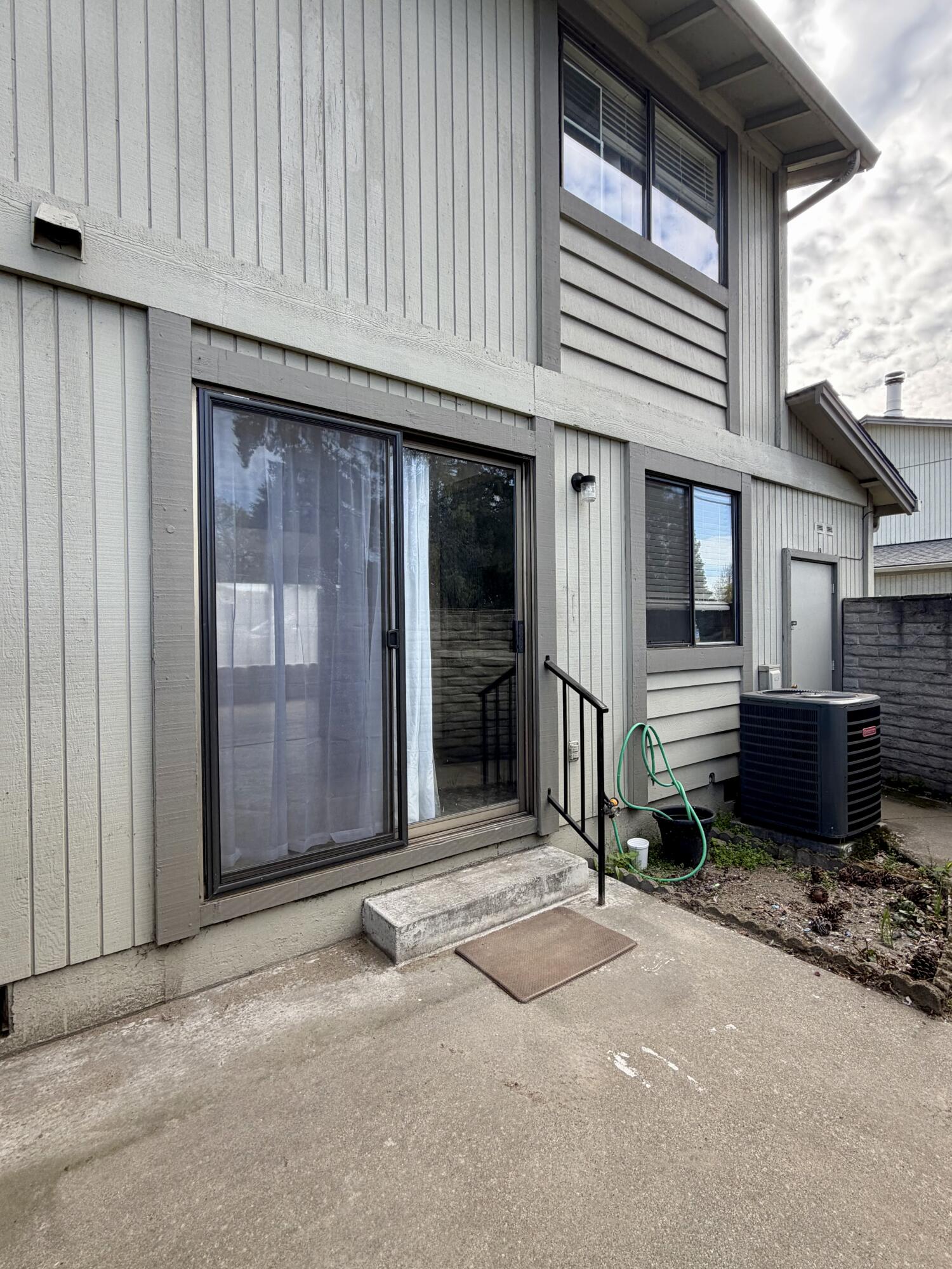 1198 Morrow Road, Unit A Medford, OR 97504 - Photo 20 of 20 a view of a house with a wooden fence