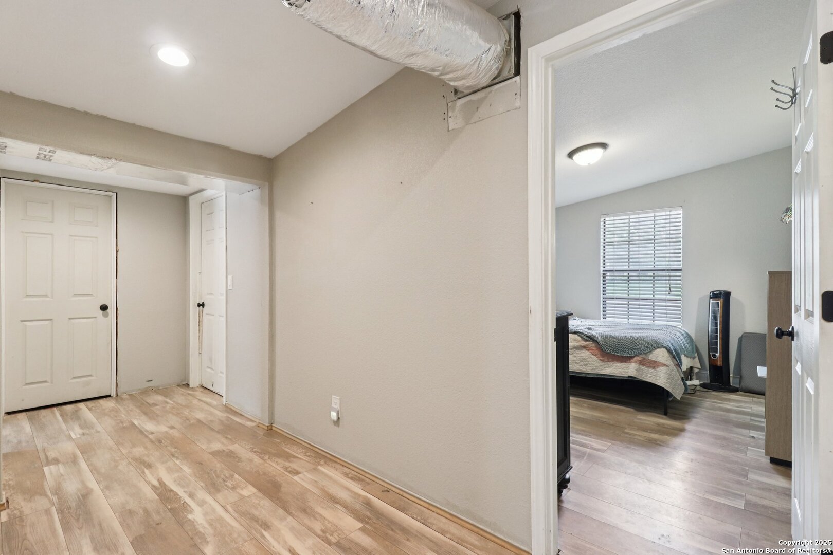 503 Mockingbird Lane Devine, TX 78016 - Photo 27 of 49 a view of a bedroom walk in closet and bedroom