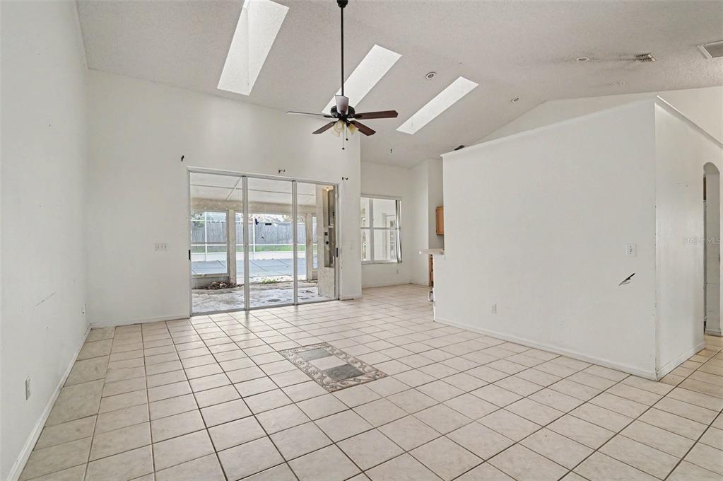 4716 Spaniel Street Orlando, FL 32818 - Photo 5 of 27 a view of an empty room