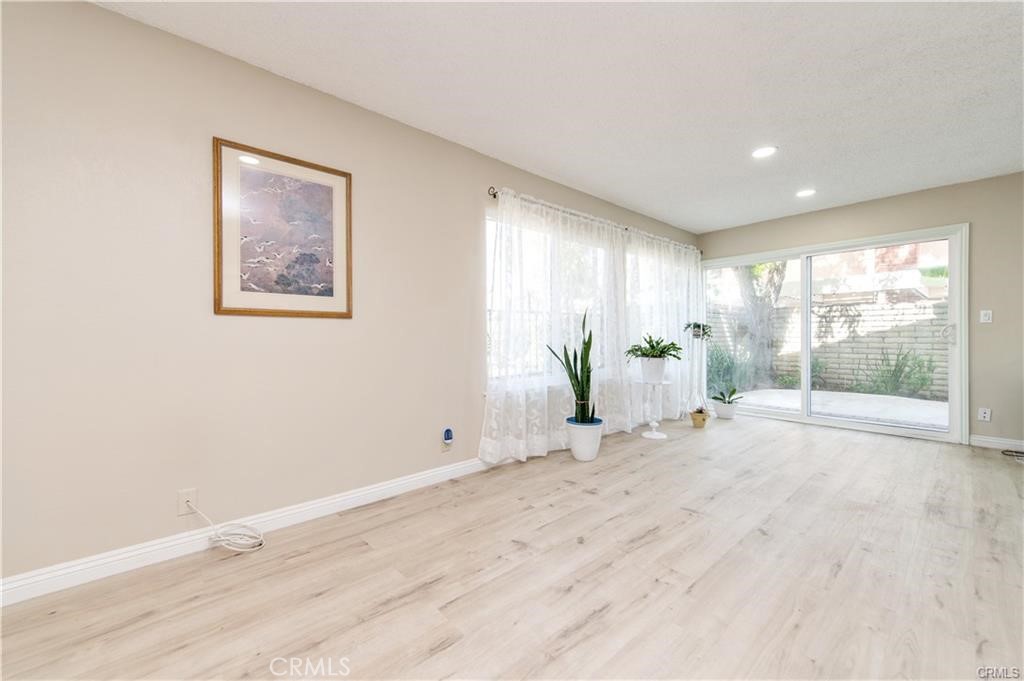 12441 Interior Circle Los Alamitos, CA 90720 - Photo 11 of 26 a view of an empty room with a window