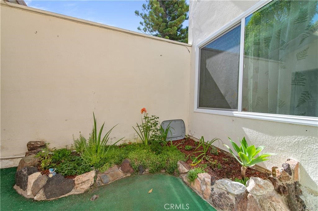12441 Interior Circle Los Alamitos, CA 90720 - Photo 24 of 26 a vase of flowers sitting on a table