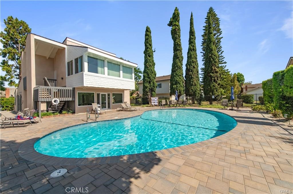 12441 Interior Circle Los Alamitos, CA 90720 - Photo 25 of 26 a view of a house with swimming pool and sitting area