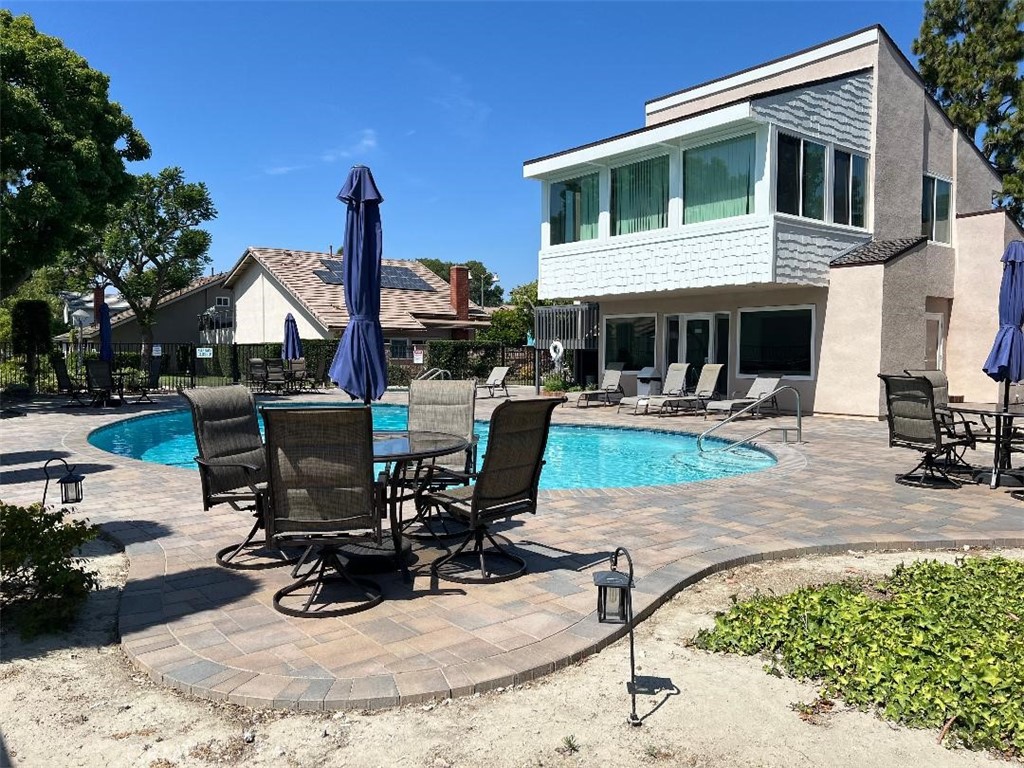 12441 Interior Circle Los Alamitos, CA 90720 - Photo 26 of 26 a view of a house with patio porch and sitting area