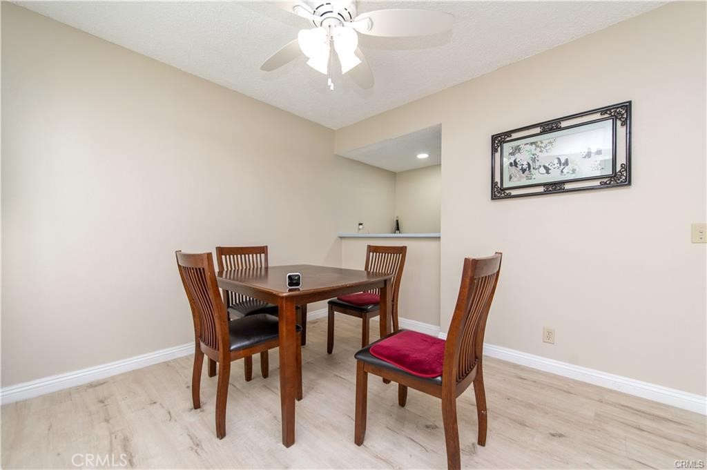 12441 Interior Circle Los Alamitos, CA 90720 - Photo 6 of 26 a view of a dining room with furniture