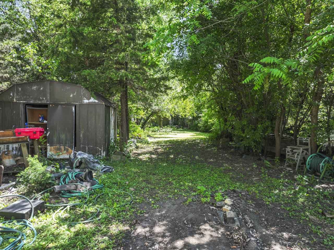 309 Landmeier Road Elk Grove Village, IL 60007 - Photo 10 of 15 a backyard of a house with lots of green space