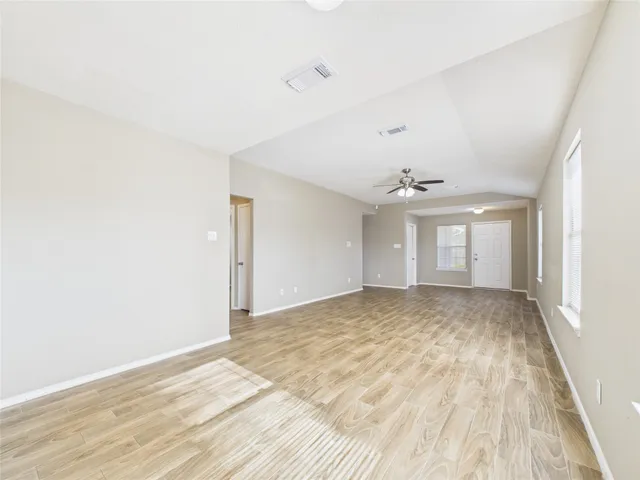a view of an empty room and window