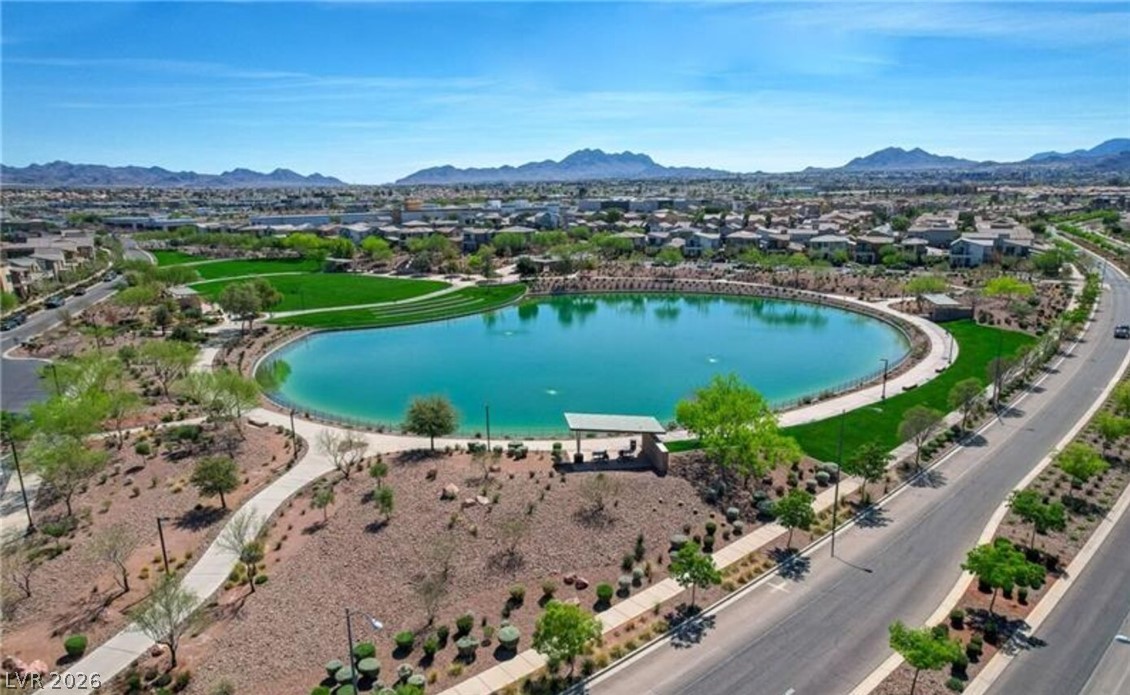 1100 East Sunset Road Henderson, NV 89011 - Photo 49 of 63 Scenic community pathways and a central lake offer direct connection to nature.