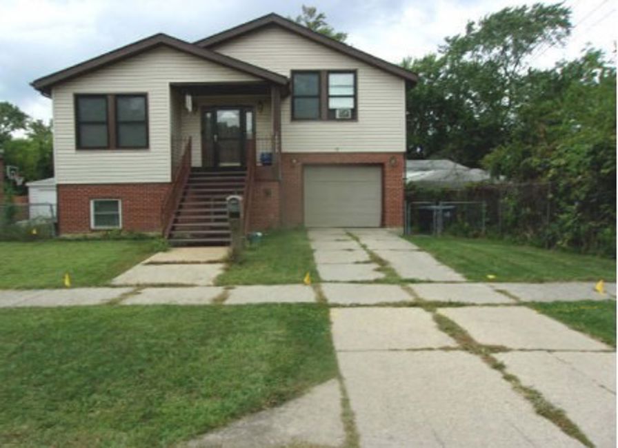 14908 Riverside Drive South Holland, IL 60473 - Photo 2 of 4 a view of a house with a yard