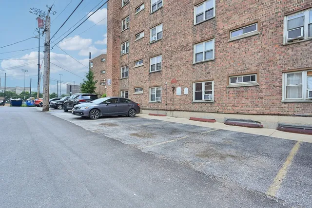 a cars parked on the side of a street