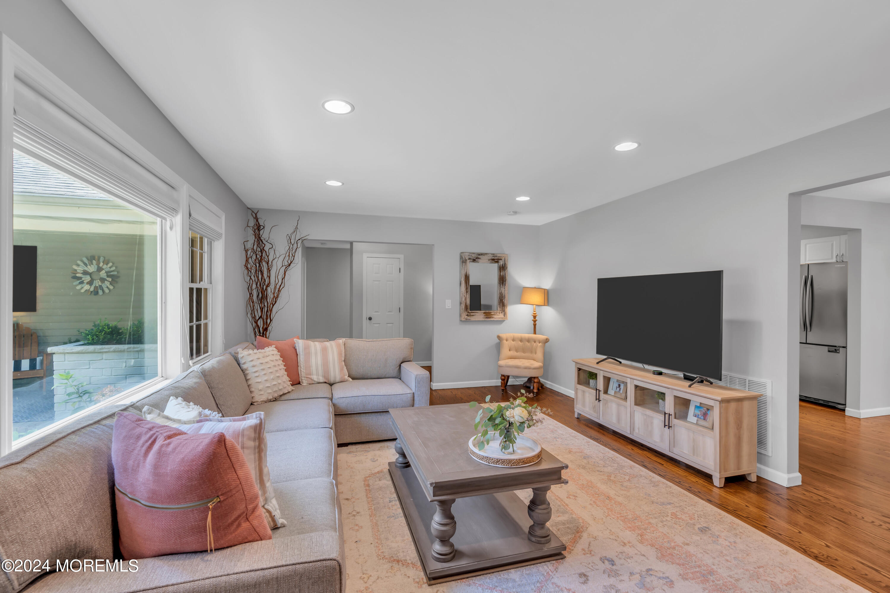 104 Five Points Road Colts Neck, NJ 07722 - Photo 12 of 46 a living room with furniture and a flat screen tv