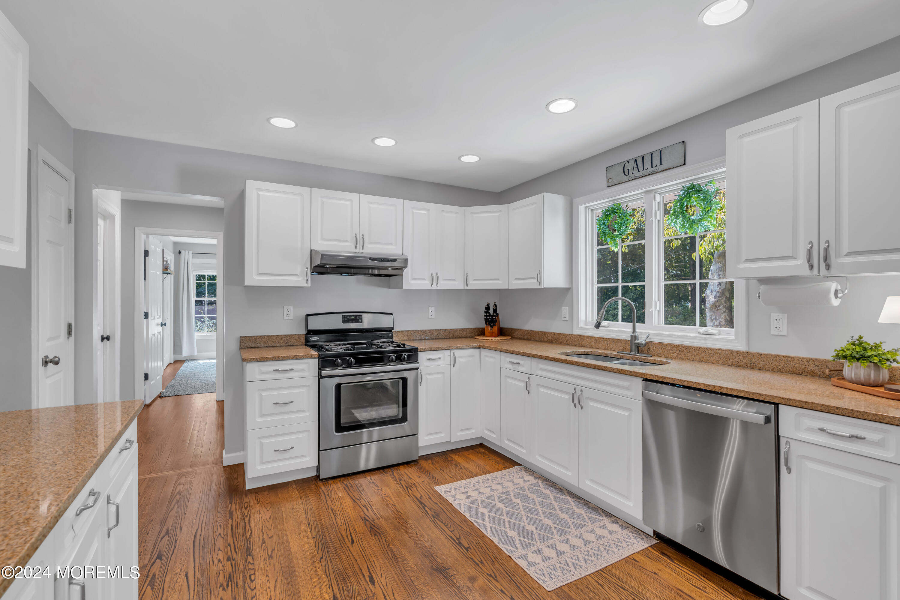 104 Five Points Road Colts Neck, NJ 07722 - Photo 15 of 46 a kitchen with a sink stove and cabinets