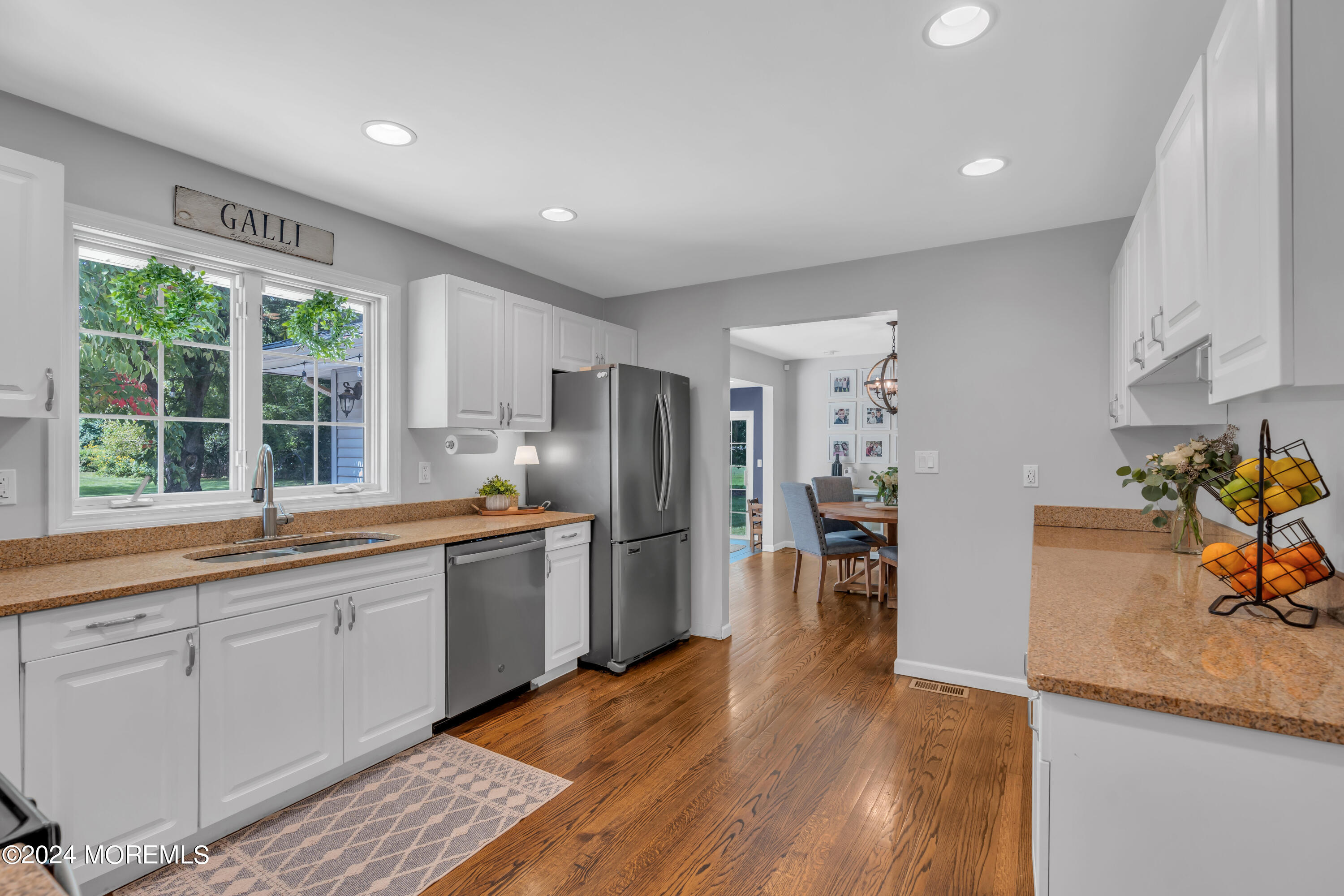 104 Five Points Road Colts Neck, NJ 07722 - Photo 17 of 46 a kitchen with stainless steel appliances granite countertop a refrigerator and a sink