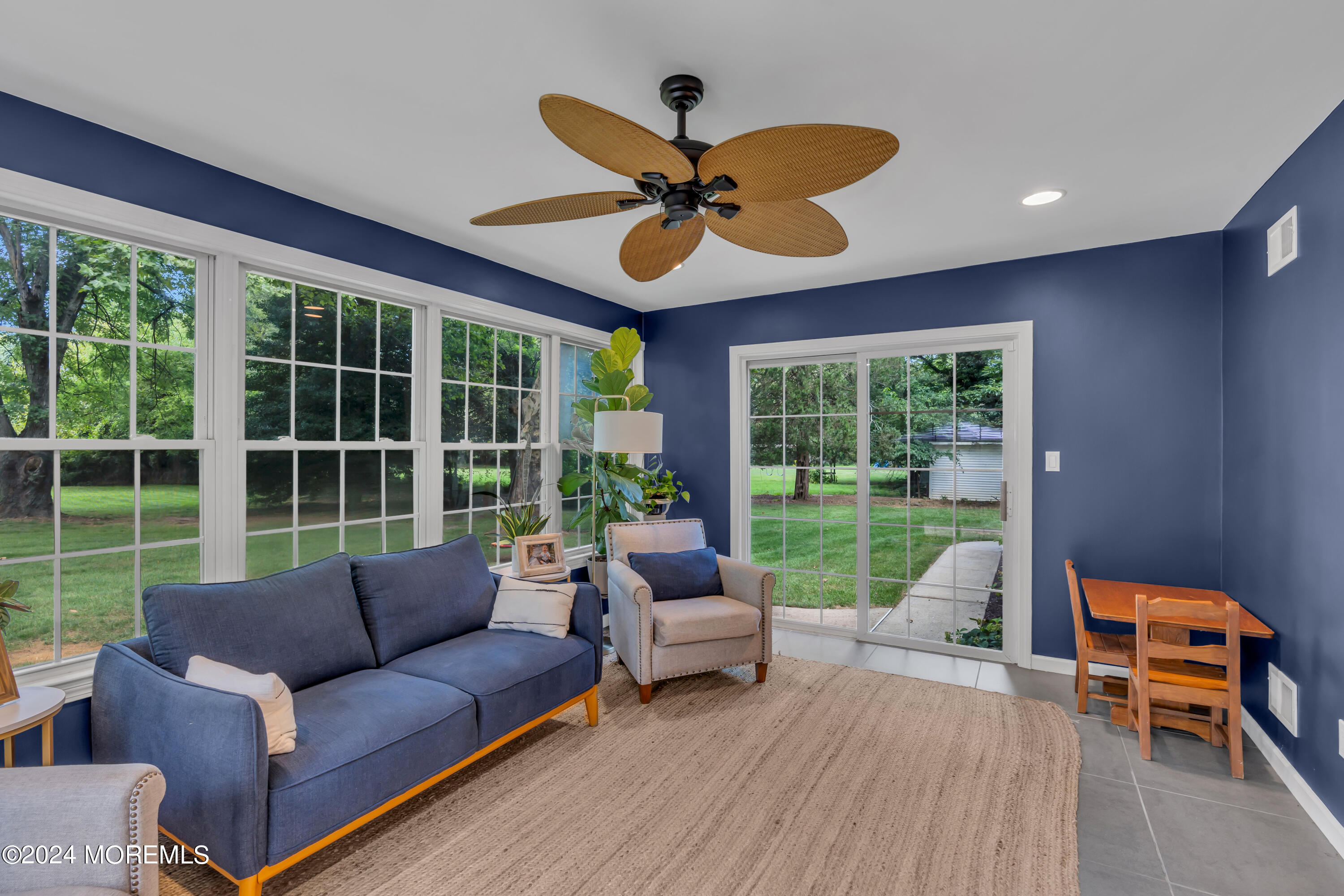 104 Five Points Road Colts Neck, NJ 07722 - Photo 21 of 46 a living room with furniture and a large window