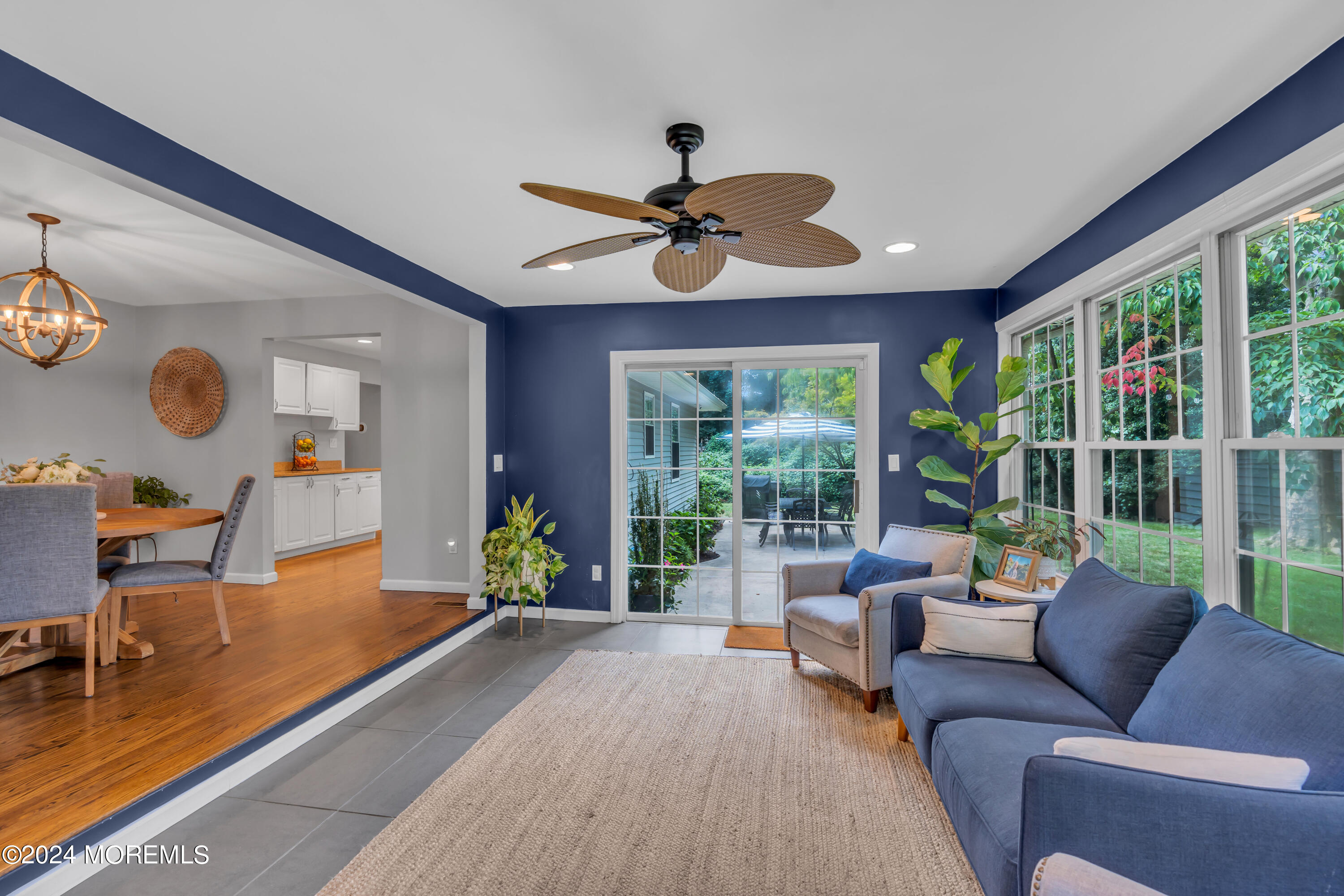 104 Five Points Road Colts Neck, NJ 07722 - Photo 23 of 46 a living room with furniture tv and a large window