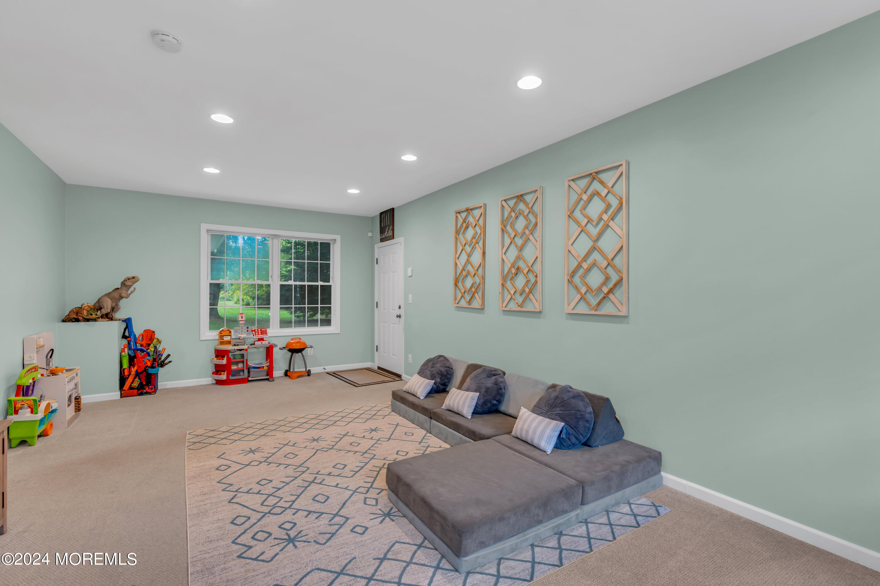 104 Five Points Road Colts Neck, NJ 07722 - Photo 24 of 46 a living room with furniture and a window