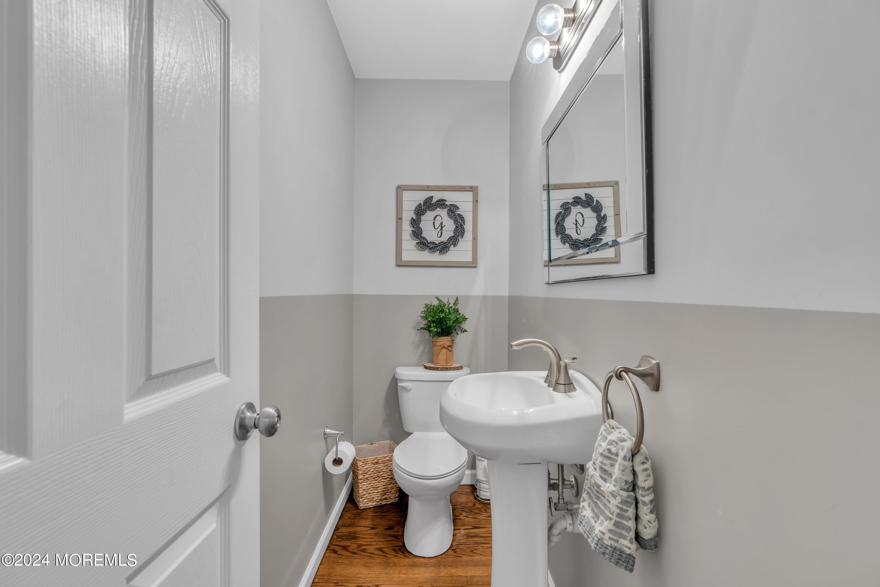 104 Five Points Road Colts Neck, NJ 07722 - Photo 27 of 46 a bathroom with a sink toilet and a mirror