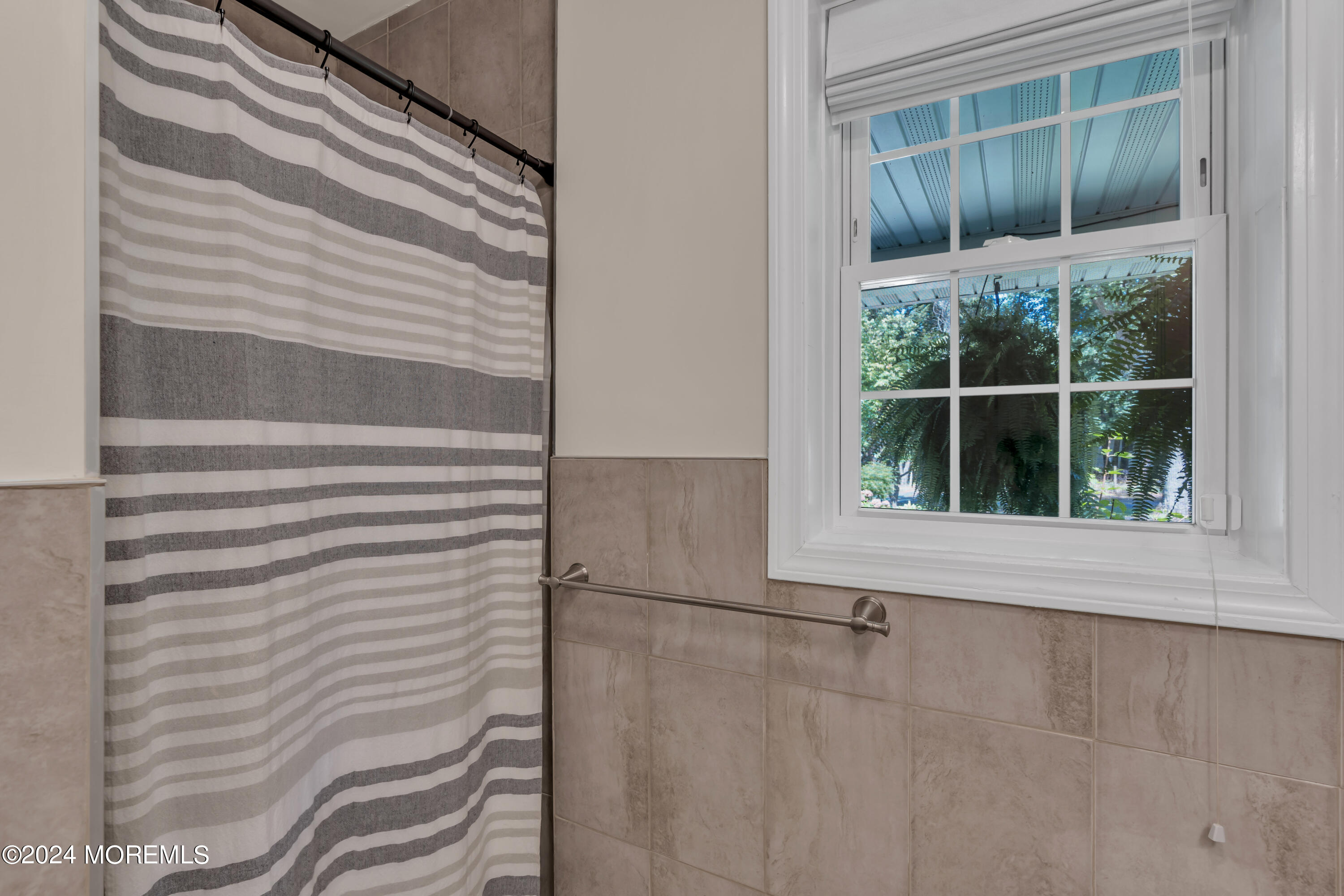 104 Five Points Road Colts Neck, NJ 07722 - Photo 32 of 46 a view of a window of the house