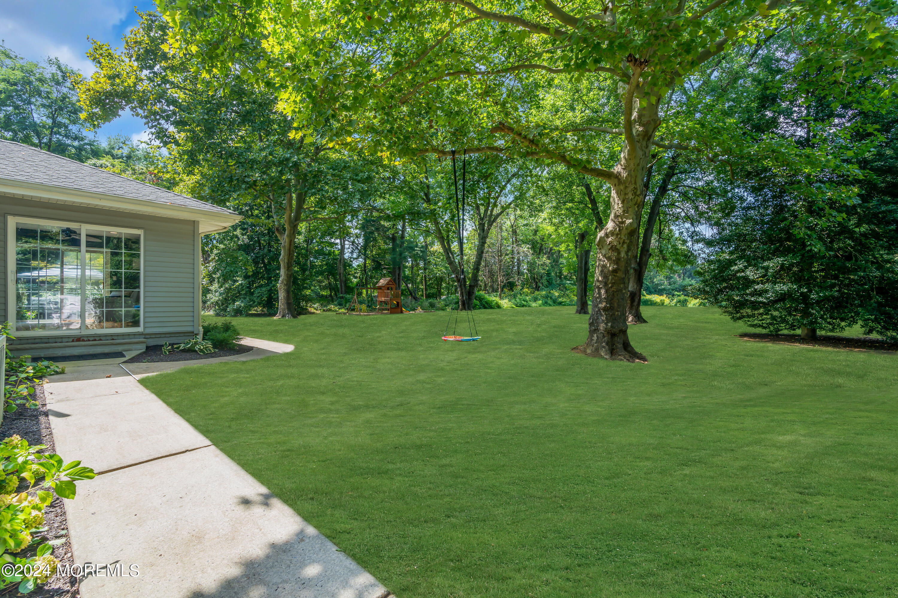 104 Five Points Road Colts Neck, NJ 07722 - Photo 41 of 46 a view of a backyard with a garden