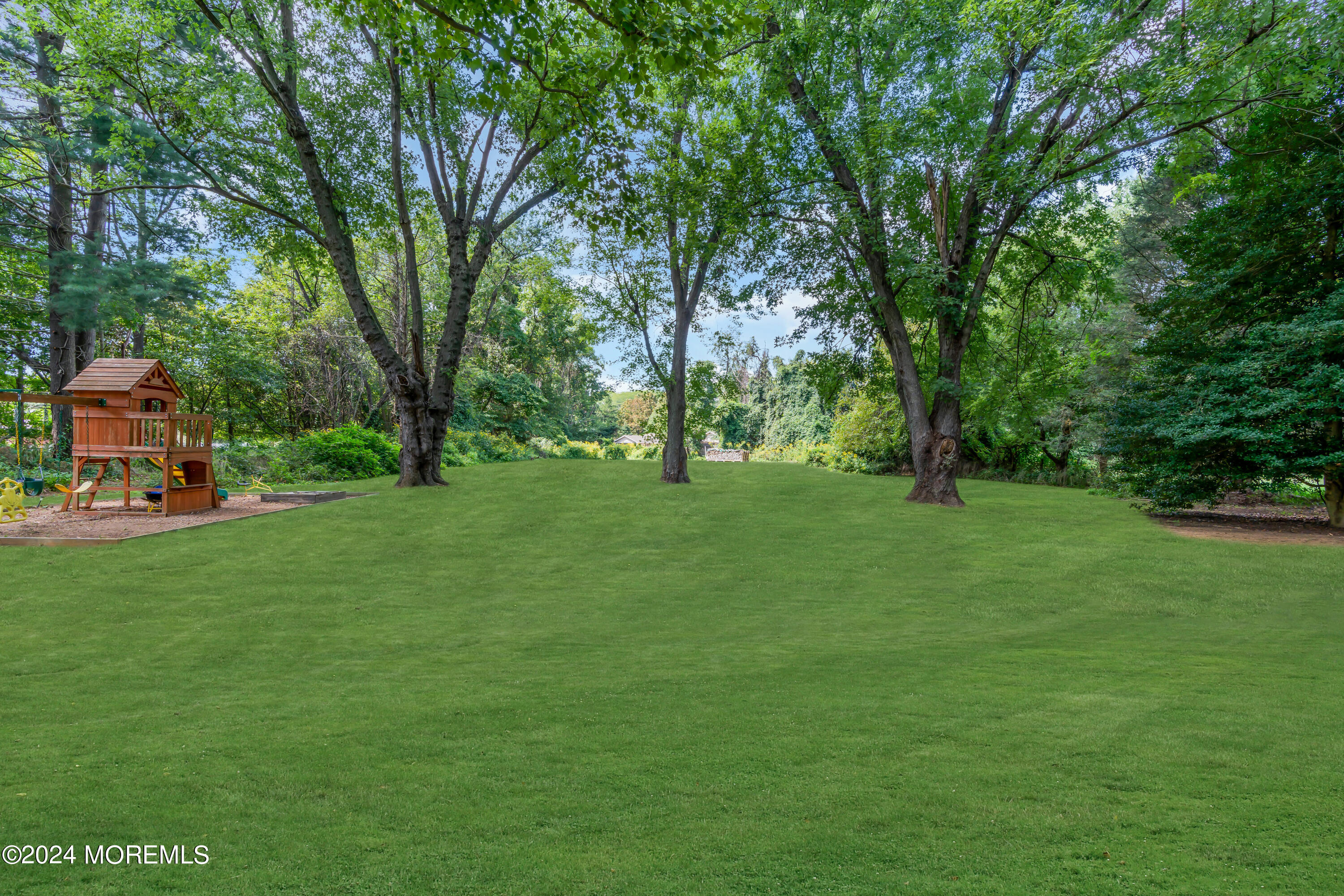 104 Five Points Road Colts Neck, NJ 07722 - Photo 44 of 46 a view of a park with large trees