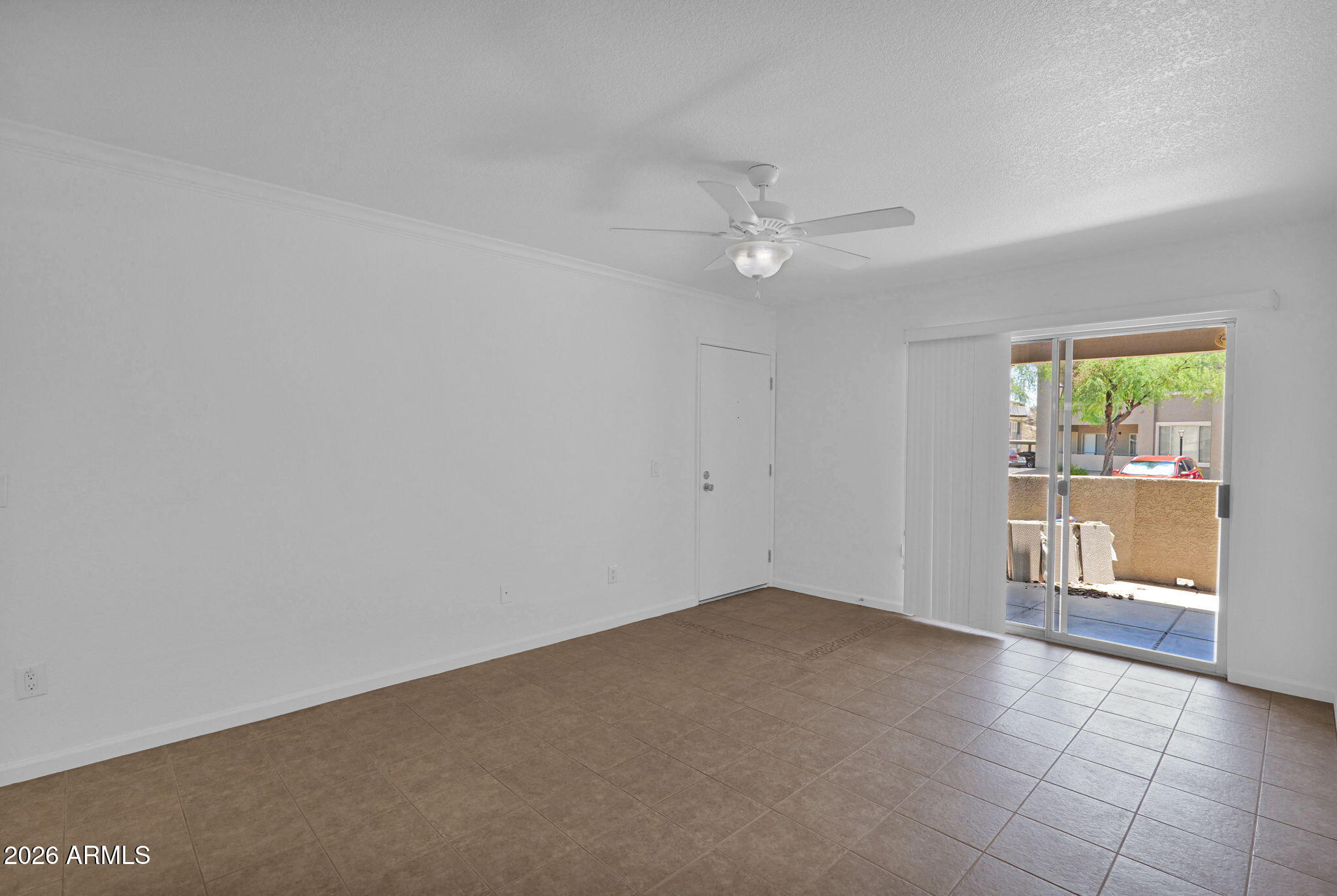 1720 East Thunderbird Road, Unit 1019 Phoenix, AZ 85022 - Photo 9 of 47 wooden floor in an empty room with a window