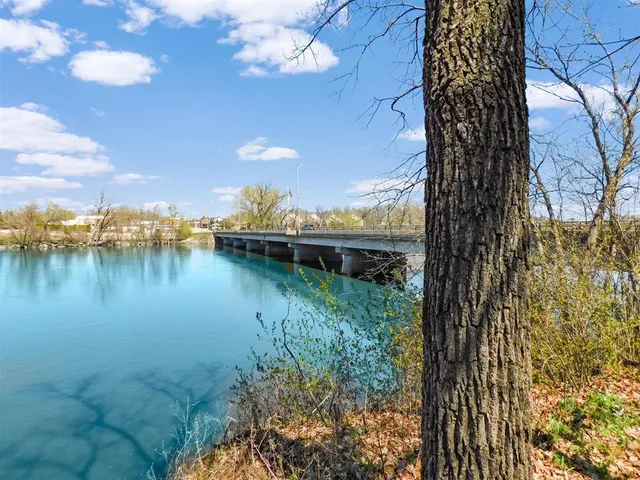 a view of lake with green space
