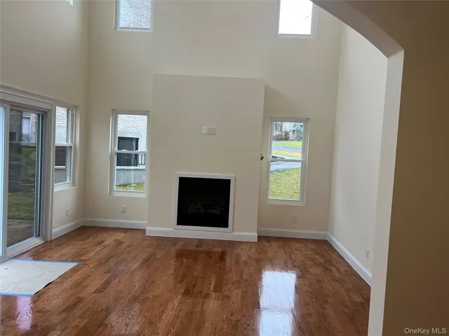 a view of entryway with wooden floor