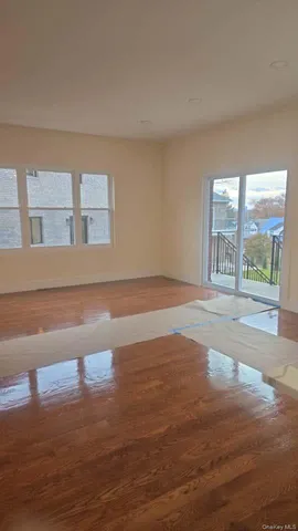 a white toilet sitting next to a white sink