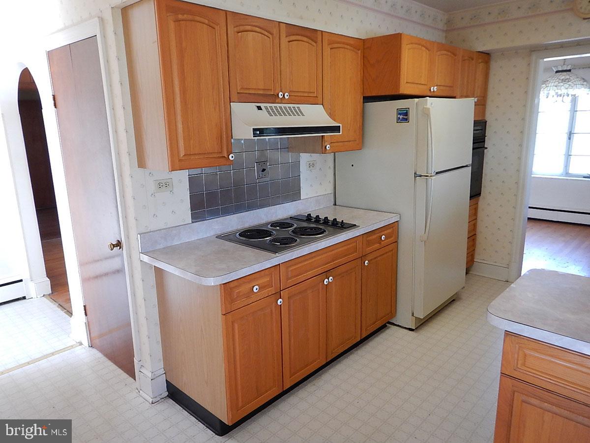 7716 Chapman Road Kingsville, MD 21087 - Photo 7 of 32 Kitchen, powder room to the left