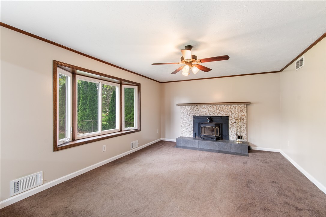 25 Spring Tree Lane Greece, NY 14612 - Photo 11 of 40 The rear family room - a great gathering space for