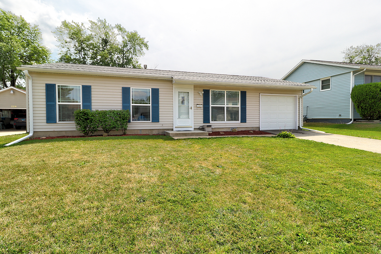 231 Murphy Drive Romeoville, IL 60446 - Photo 1 of 14 front view of a house with a yard