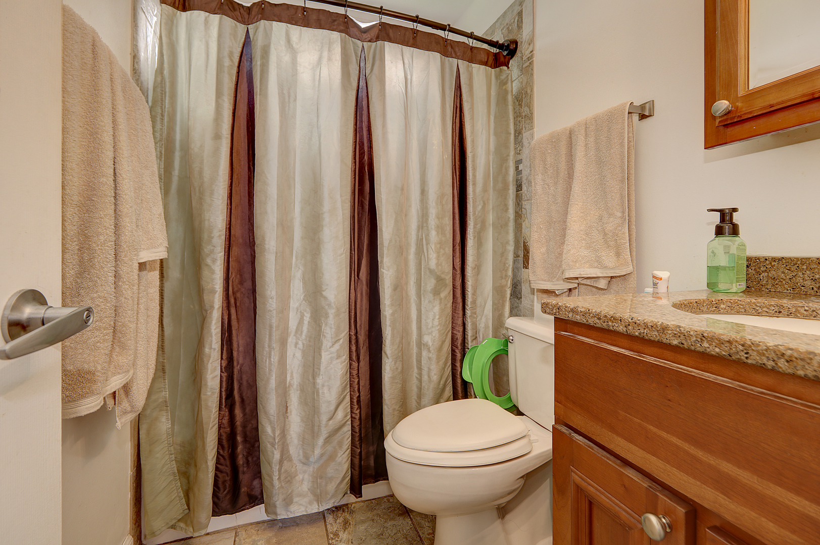 231 Murphy Drive Romeoville, IL 60446 - Photo 12 of 14 a bathroom with a granite countertop sink and a mirror