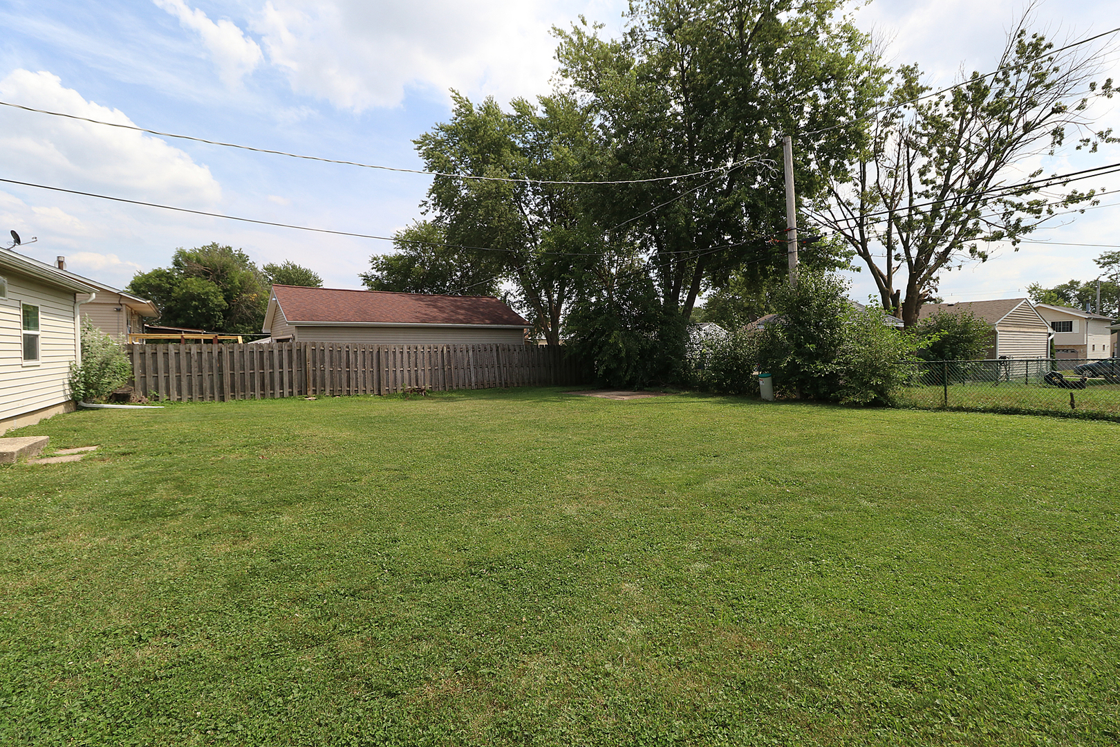 231 Murphy Drive Romeoville, IL 60446 - Photo 14 of 14 a view of a house with backyard and garden