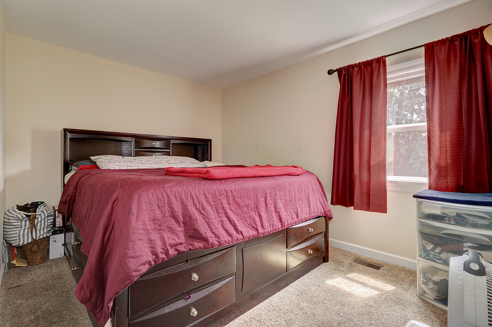 231 Murphy Drive Romeoville, IL 60446 - Photo 9 of 14 a bedroom with a bed and window