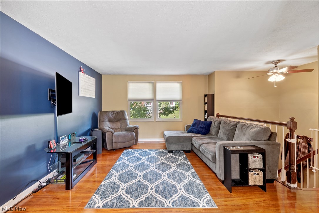 1547 Sunnyacres Road Akron, OH 44321 - Photo 4 of 23 Living room with light hardwood floors