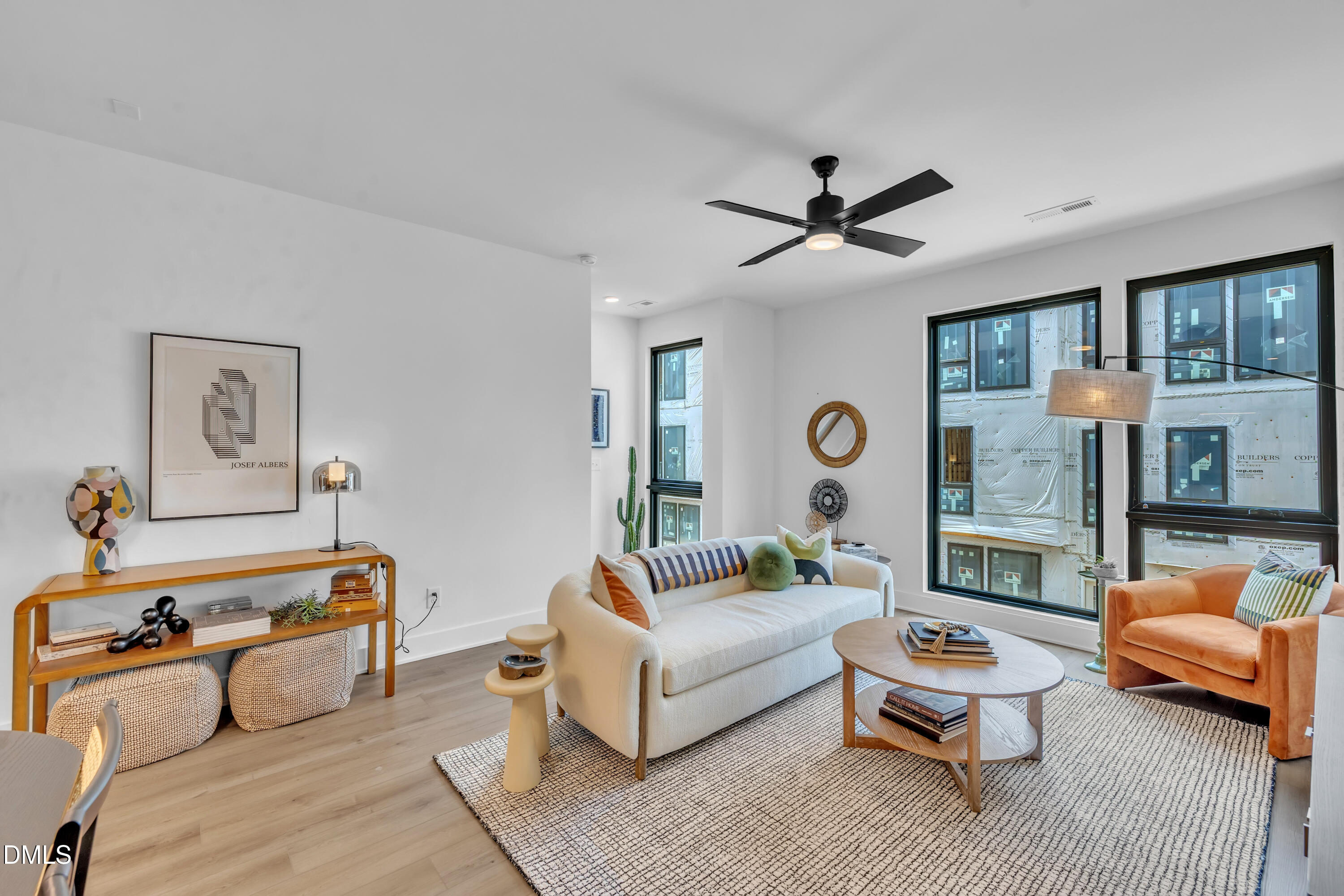512 Gordon Street, Unit 305 Durham, NC 27701 - Photo 19 of 38 a living room with furniture and a large window