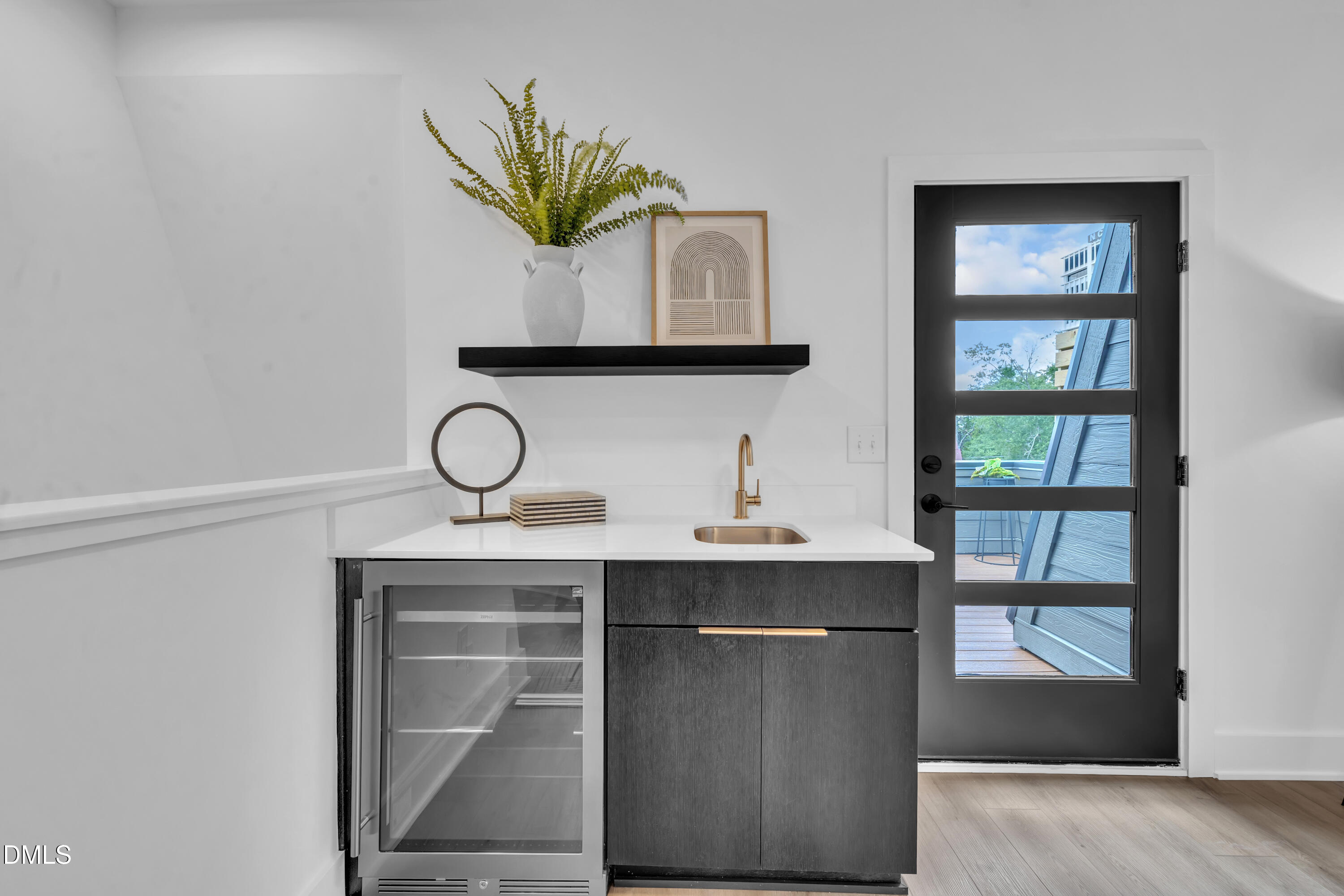 512 Gordon Street, Unit 305 Durham, NC 27701 - Photo 29 of 38 a room with a sink and a mirror
