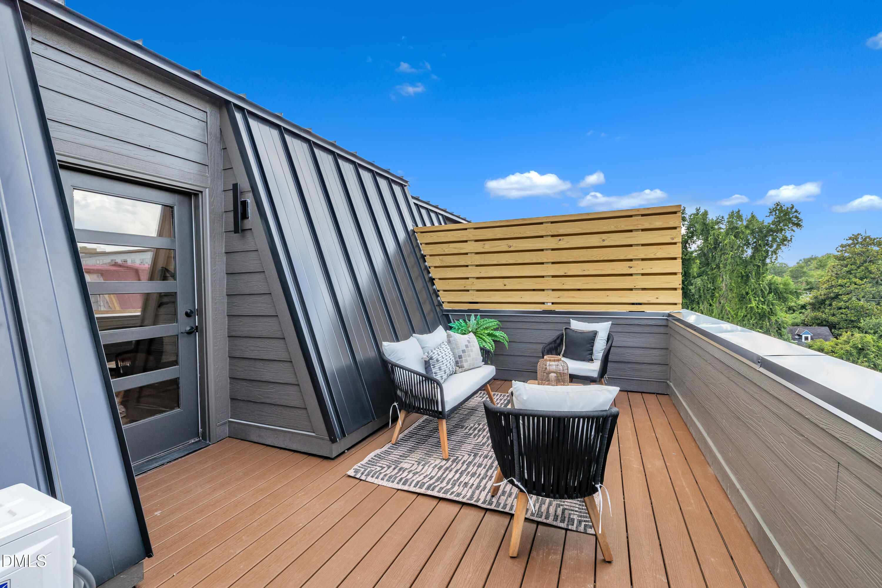 512 Gordon Street, Unit 305 Durham, NC 27701 - Photo 30 of 38 a view of balcony with wooden floor and seating space