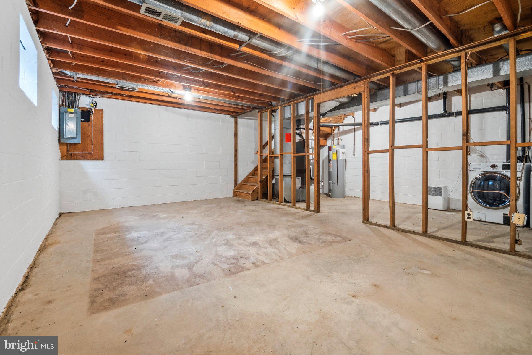 9080 Moonshine Hollow, Unit F Laurel, MD 20723 - Photo 23 of 24 Spacious unfinished basement ready for ideas.