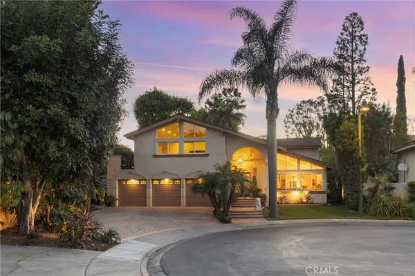 a view of a house with a swimming pool