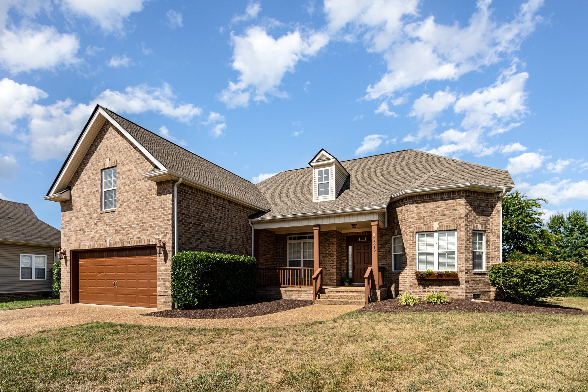 6015 Warner Court Spring Hill, TN 37174 - Photo 1 of 35 a front view of a house with a yard